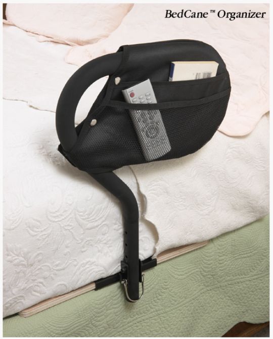 BedCane shown with organizer for easy storage of remotes and other bedside items.