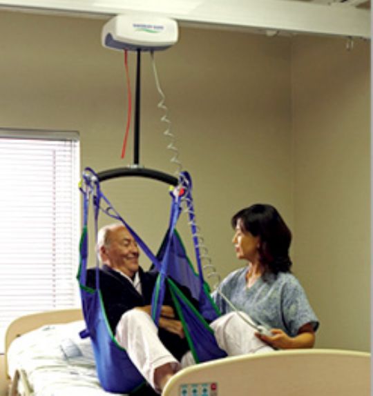 C-625 Fixed Ceiling Lift Lifting Patient 