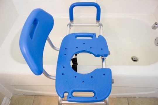 HydroGlyde Sliding Tub Transfer Bench placed inside of a standard-sized bathtub