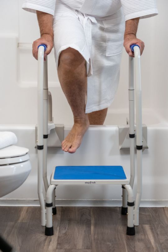 Step out of the tub onto a no slip platform