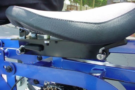 Western saddle-style seat with quick-release adjustment feature